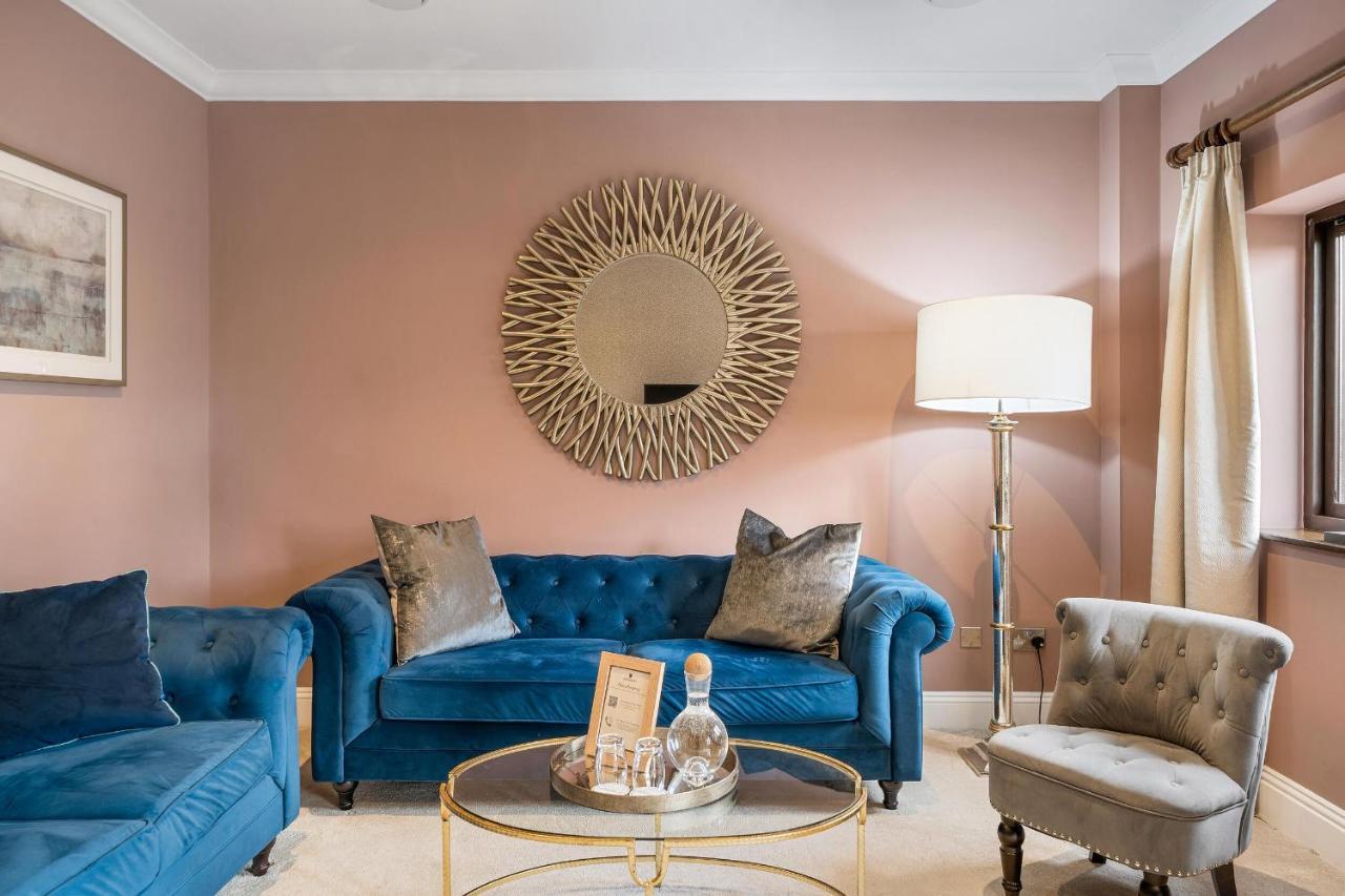 Boringdon Hall Hotel And Spa Plymouth Exterior photo A living room with a floor lamp